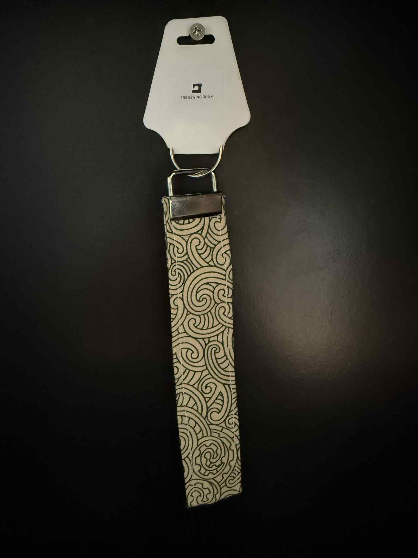 Creme Koru Wristlet