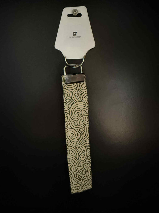 Creme Koru Wristlet